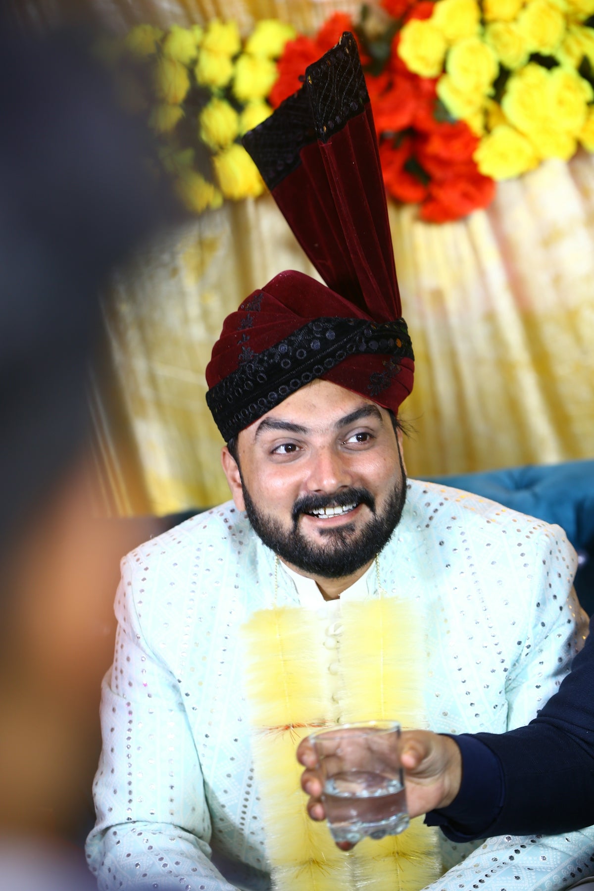 A couple of men sitting next to each other