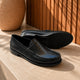 Serara - glossy snake-embossed leather penny loafers for women