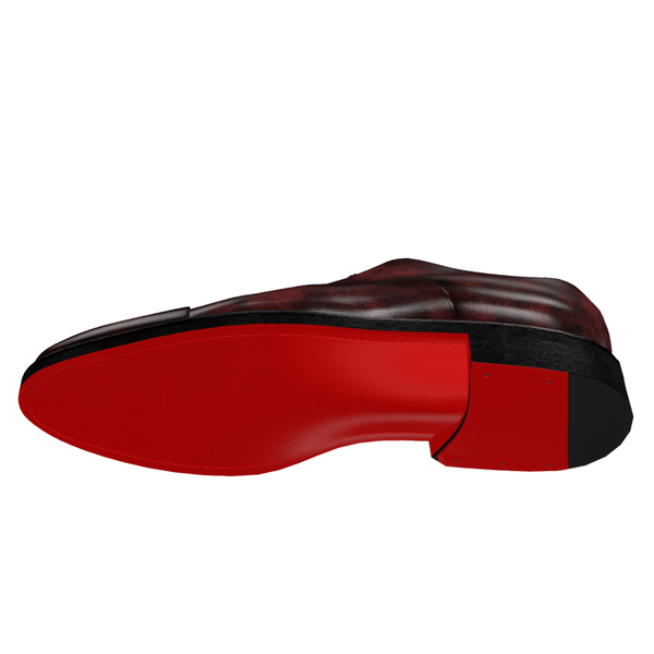 Red and black shoe displayed on a computer screen with editing tools.