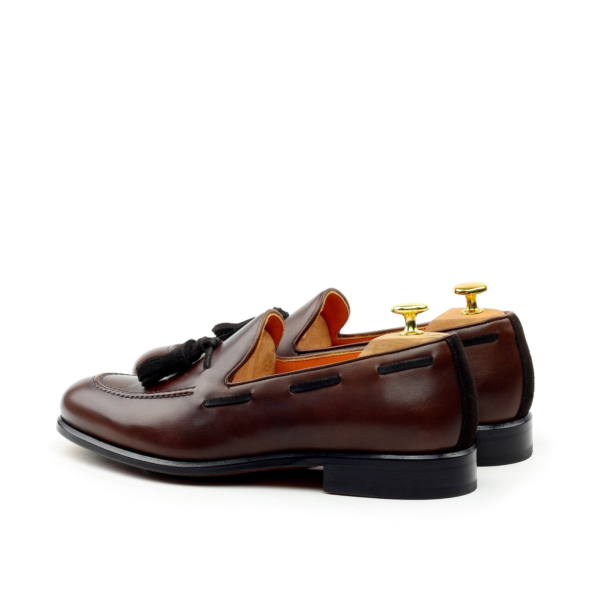 Versan - Classic dark brown leather tassel loafers.